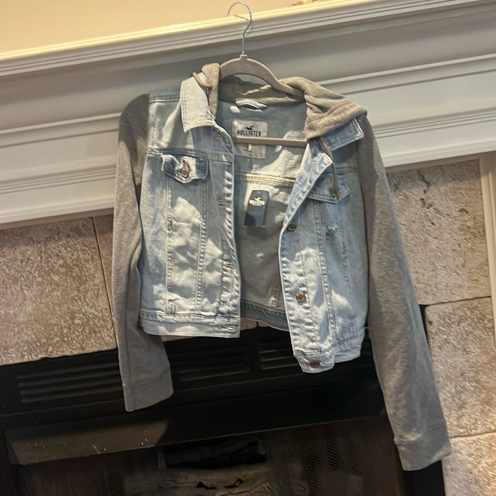 Brand new Hollister Jean jacket, distressed with sweatshirt sleeve & hood